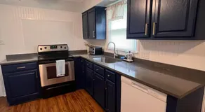 Cozy Stay Near DT with Deck and Yard - Image 5