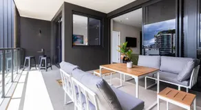 West End 2BR Gem with Rooftop Pool, Balcony & Parking - Image 3
