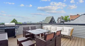 Elegant 2BR-2BA Spacious Escape with Rooftop Near NYC - Image 4