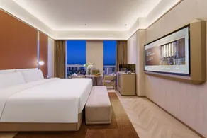 Dalian High-Tech Wanda Plaza Maritime University Crystal Orange Hotel - Image 3