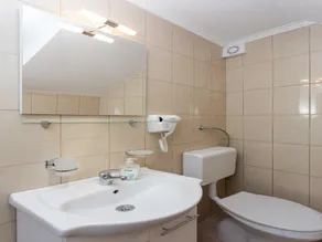 Apartments Djurkovic - Deluxe Studio with Balcony and Garden View - Image 2