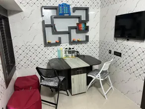 Rumi HomeStays-103-1 BHK Premium Furnished Room with Modern Bathroom, Kitchen and Dining - Image 4