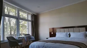 Super 9 Express Hotel - Image 2