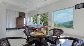 ELIVAAS Signature Stars and Windsongs with Shared Pool, Garden, Game Zone, Restaurant, & Hill Views Pet-friendly - Image 4