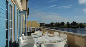 Peaceful boathouse located in a water activity-rich area - Image 2