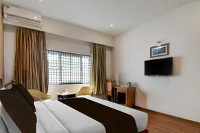 Super Townhouse Oak Sri Mahadeshwara Convention Centre Formerly Shri Aprameya Resort - Image 2