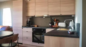 Modern apartment with balcony and view - Image 4
