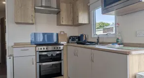 Coastal Comfort Relaxing 3-Bed Holiday Home at Marlie Holiday Park - Image 2