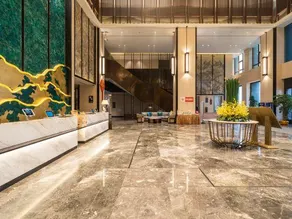 Xinzheng Xingangwanhua Hotel - Image 5