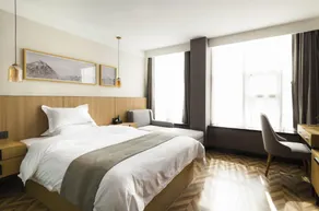 Huating Huarong TIME Hotel - Image 4