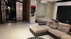 شقـة فندقيـة بحديقـة خـاصة - كـمبوند روضـة زايـد - Image 5