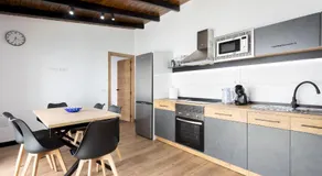 Home2Book Rustic Stone Haven with Terrace - Image 3