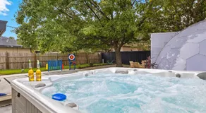 Luxe Family Escape with Games Hot Tub and Yard - Image 5