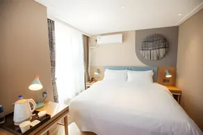 Home Inn Neo Songyuan Guoerluosi Avenue - Image 4