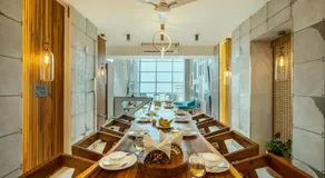 SaffronStays Nautica - 5BR hilltop villa with rooftop pool, sea views & modern interiors surrounded by greenery - Image 4