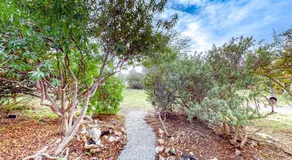 Eco-Conscious Home with Spacious Yard & EV Charger - Image 4