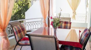 Spacious 2BR Apartment with Balconies - Image 2