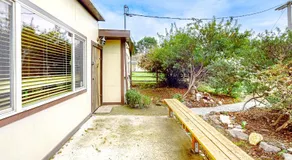 Eco-Conscious Home with Spacious Yard & EV Charger - Image 2