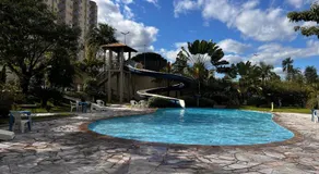 Flat com Piscinas Termais e Área de Lazer Completa - Image 3