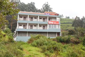 Capital O Hotel Rain Forest - Image 4