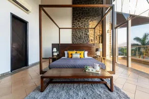 StayVista's Emerald Acres offering a heated pool, bonfire, snooker table, scenic views, tennis court, steam room, gazebo, & gym - Image 2