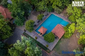 StayVista at Vannraj Farm Villa with Shared Pool & Bonfire - Image 2