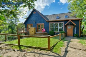 Sunset Cove Lakefront Luxury Lodge with Private Dock - Image 1