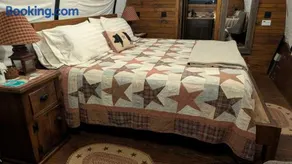 Highland Cow Glamping in a Cozy King Bed Wagon - Image 3
