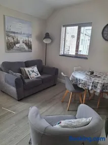 UlsterApartments one bedroom 2 single beds and sofa bed - Image 2