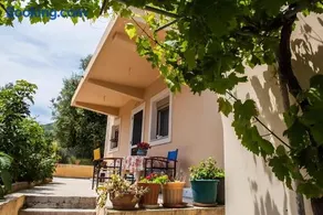 Flamiatos Garden Cottages - Image 2