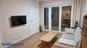 Modern terraced apartment with green garden - Image 2