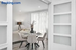 Modern Escape Warm & Welcoming 2BR Home - Image 2