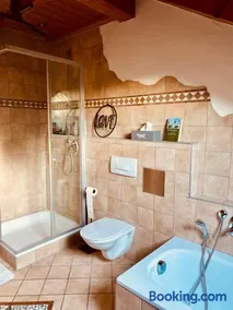 Gemütliche Wohnung mit Ofen und Naturblick - Image 3