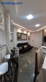 Lindo Flat no Edifício Cosmopolitan, com GARAGEM e PISCINA - Image 1