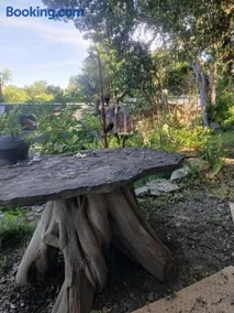Pickles Place is a Stacked container home in the Texas Hill Country this space is surrounded by giant Elm trees lush greenery across the street from the San Gabriel river one double bed full size shower & full kitchen plus BBQ pit & flategrill - Image 3