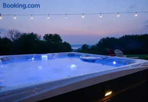 Kinderfreundliches geräumiges Ferienhaus mit Grill, Whirlpool und Garten | Seeblick | Ideal für Homeoffice | Haustiere erlaubt - Image 3