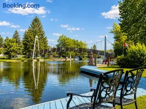 Canalside Summer Cottage with Waterview, Custom Bar, BBQ, and Fireplace - Image 2
