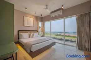 SaffronStays Nautica - 5BR hilltop villa with rooftop pool, sea views & modern interiors surrounded by greenery - Image 2
