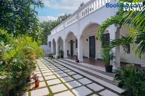 Agam Villa by VEO, StayVista - 5BHK with Shared Pool & Lawn - Image 1