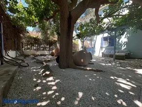 Blue Seaside House with Garden - Image 1