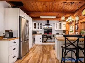 Riverfront cabin with hot tub and sauna 1st floor - Image 1