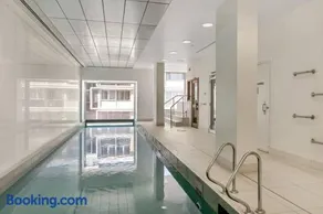 Lovely 1BR Apartment On Morphett with Pool & Wi-Fi - Image 3
