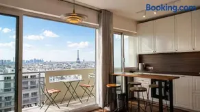 Elegant Eiffel View Apartment Balcony and Garage - Image 1