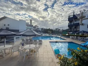 Apartamento Pé na Areia - 2 Quartos - Acesso Privativo à Praia - Ideal para Famílias - Image 2