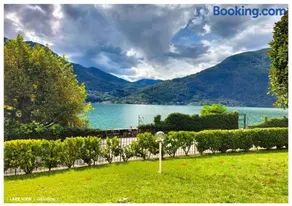 LFSUITE LuganoLake Terrazza Spiaggia privata Parking WI-FI Netflix - Image 1
