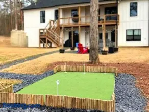 Modern Lakefront Home with Private Putting Green - Image 1