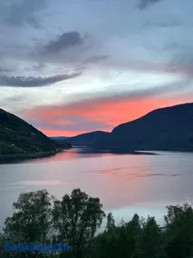 Olden house fjord and sunset - Image 1