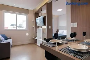 Studio prox shopping Curitiba Wifi, TV a Cabo e ar by UROOMS - Image 1