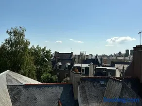 T2 dans le quartier Saint-Michel de Saint Brieuc Vue sur les toits - Image 1