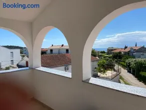Agréable appartement de vacances avec barbecue | Vue jardin | À côté de la plage - Image 5